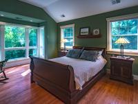 master bedroom with large windows - Two story renovation - Loucks project