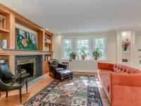 the living room towards three large picture windows - The Shire of Spring Valley - Ballard & Mensua