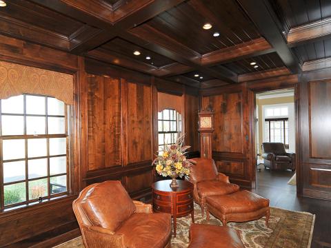 All wood den for Sugarland Lane home, complete with leather recliners