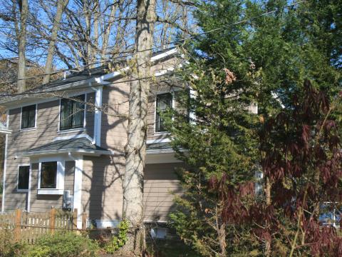 Eng - small cape code renovation - exterior rear view