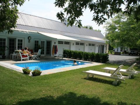 Enrico-Easton - waterfront cottage renovation - exterior rear with lap pool