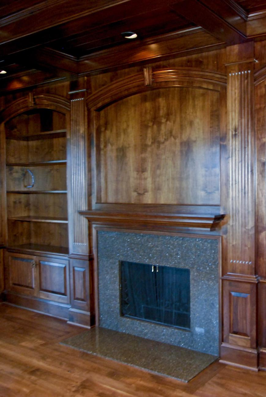 Dark wood sitting room and dark grey fireplace feature for Sugarland Lane