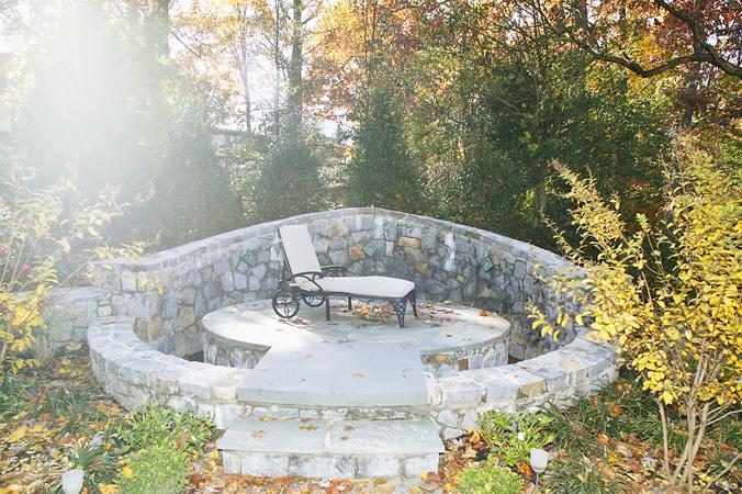 The finalized reflecting pond complete with chaise for outdoor entertaining