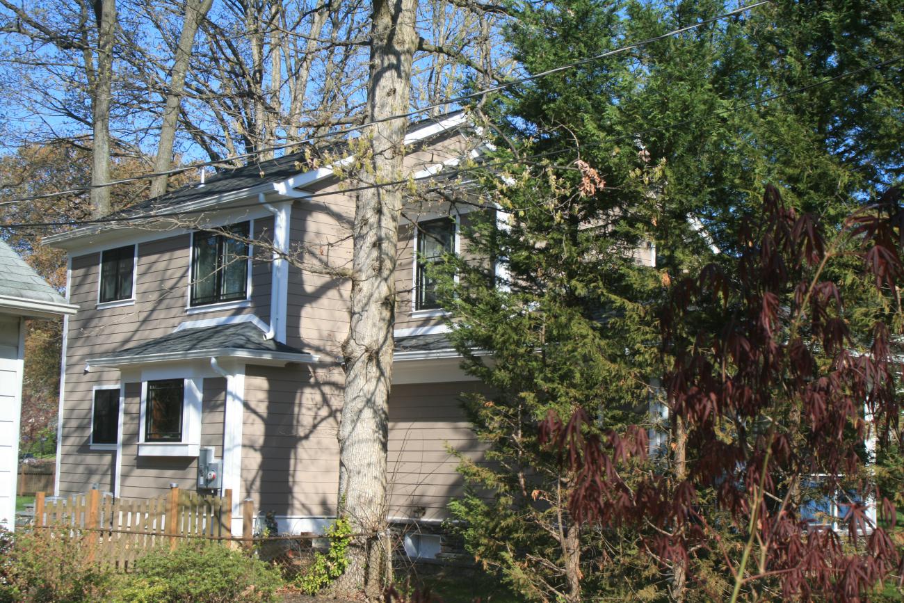 Eng - small cape code renovation - exterior rear view